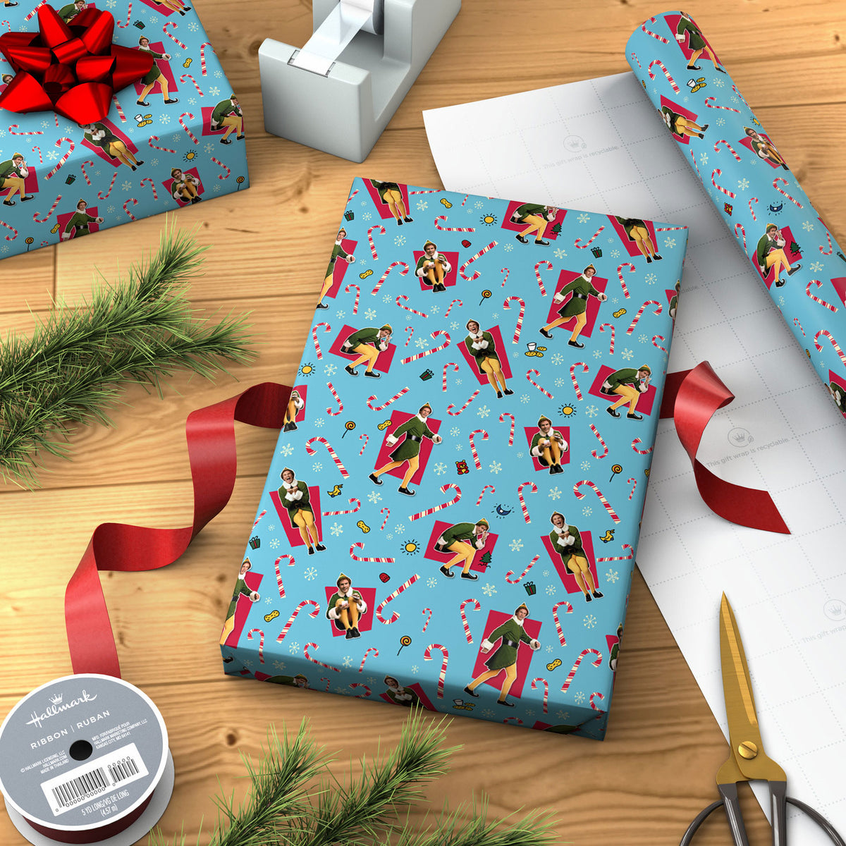 Hallmark Elf Buddy the Elf™ Poses on Blue Christmas Wrapping Paper Roll, 25 sq. ft.