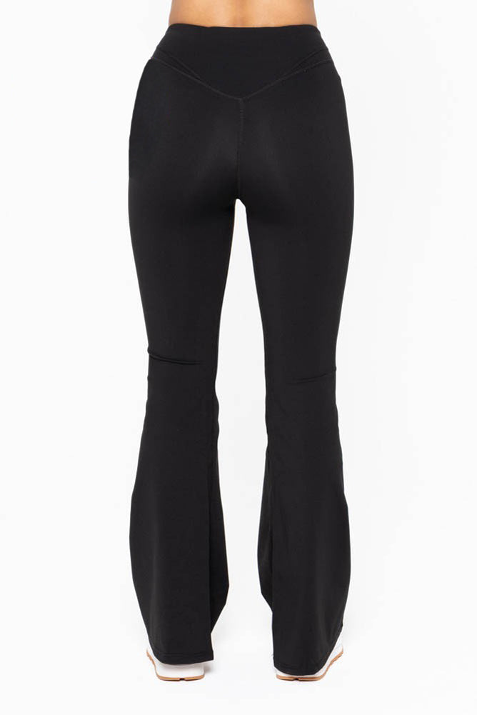 Plus Curvy Contour Seam Flared Leggings in Black by Mono b