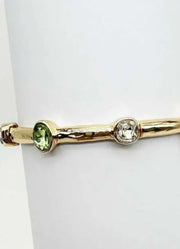 Green Crystal on Gold Bar Stretch Bracelet by Whats Hot