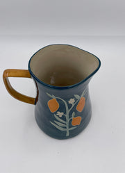 Stoneware Pitcher with Flowers by Creative Co-op