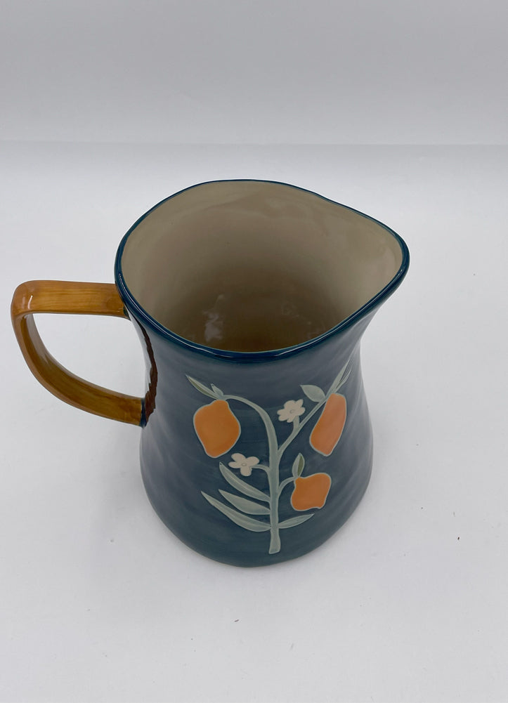 Stoneware Pitcher with Flowers by Creative Co-op