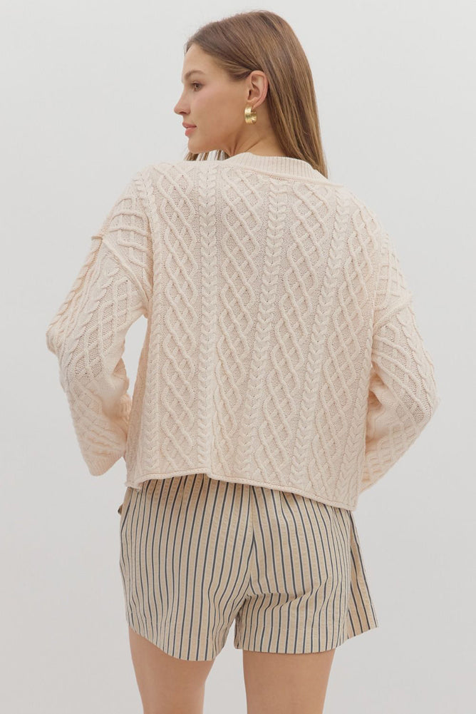 Solid Cropped Cable Knit Cardigan in Ecru by Entro