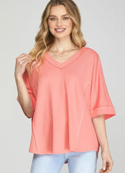 Half Sleeve Knit Top with Raw Hem in Coral Pink by She + Sky