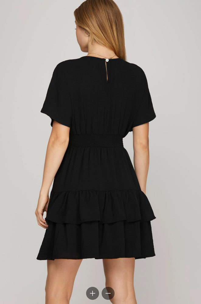 Drop Shoulder SS Tiered Mini Dress in Black by She + Sky