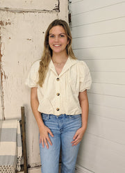 Solid Bubble Hem Top with Short Puff Sleeves in Ecru by Entro